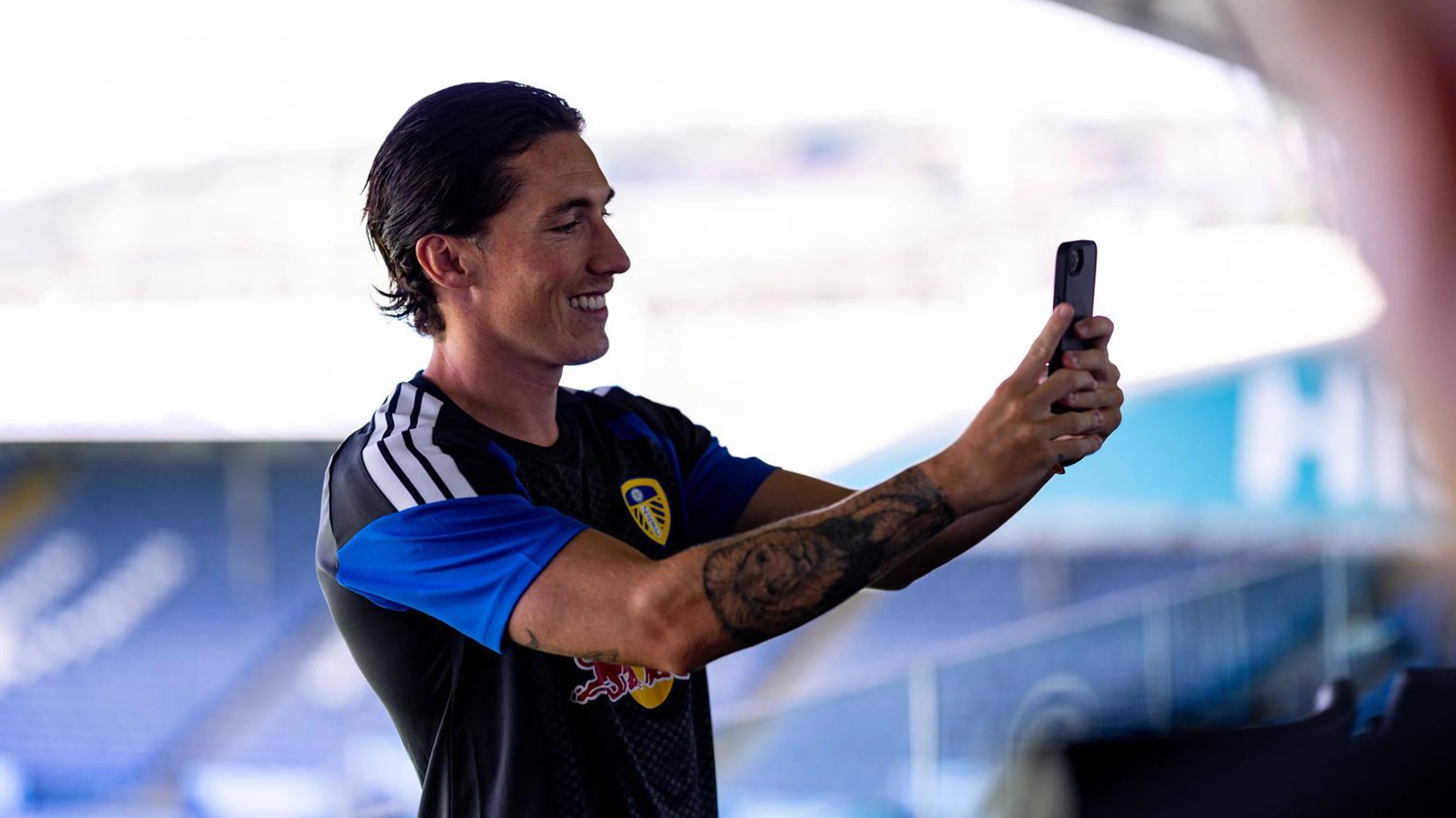 Harry Wilson records a message at Elland Road on his July 2026 signing day