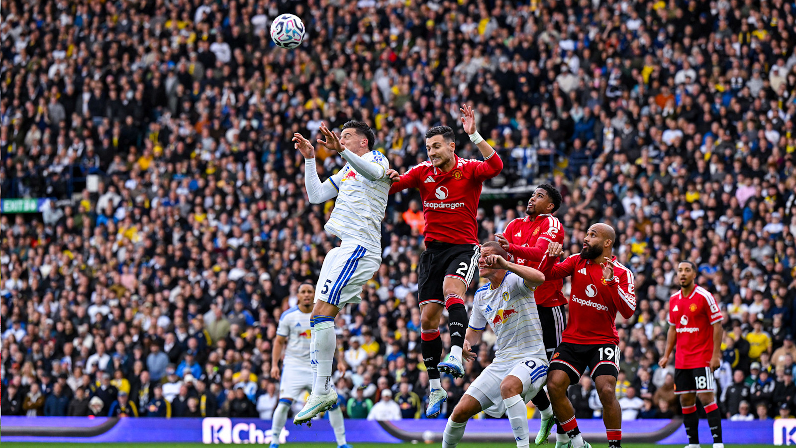 Tarik Muharemovic heading: the Leeds defender rises to win a header against Manchester United